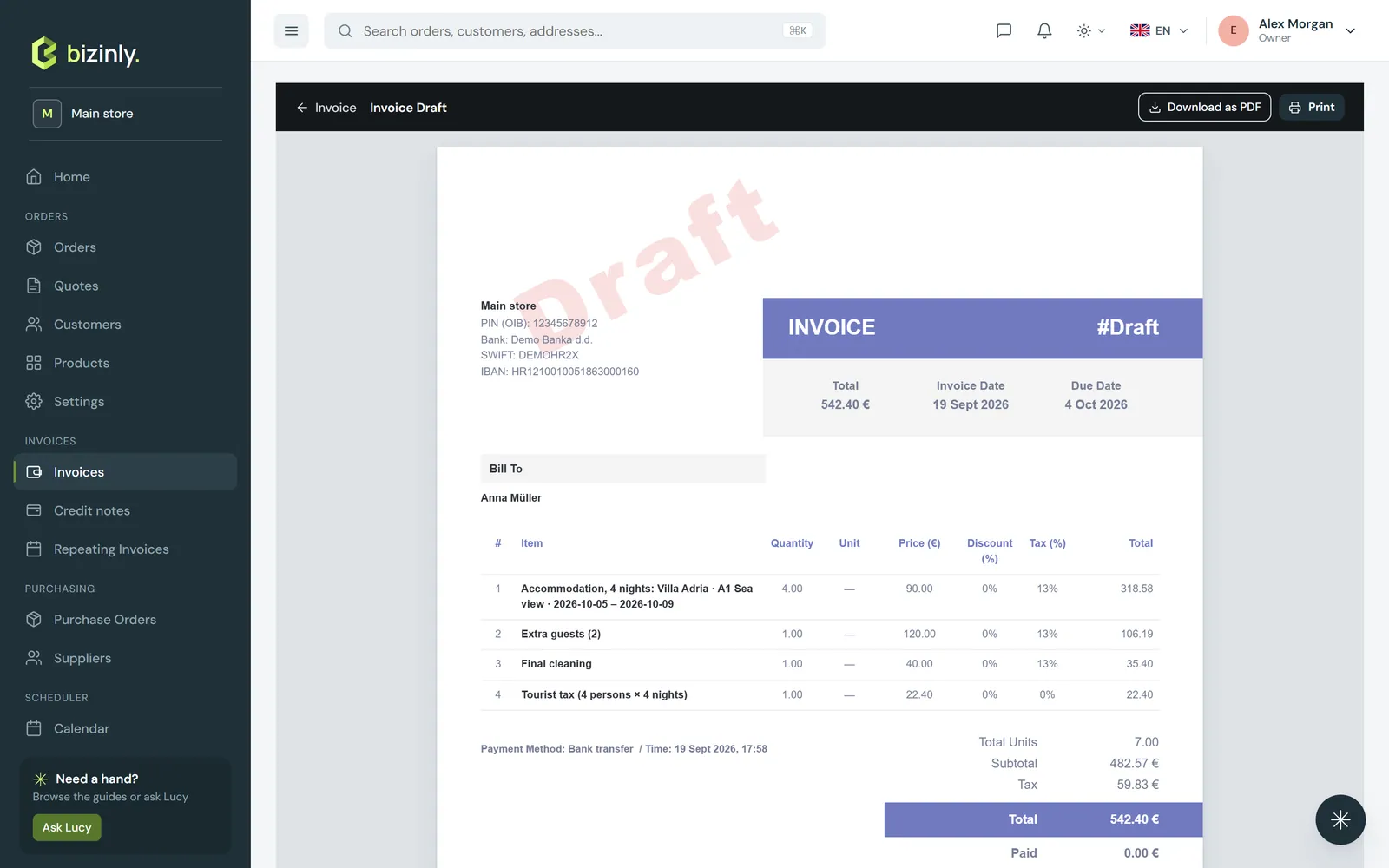 A draft invoice's print preview, with the DRAFT watermark, seller and buyer details, the line table and totals
